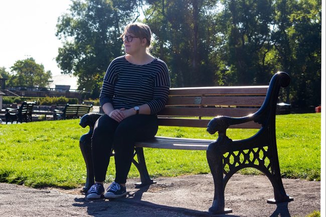 Woman on bench in Stanley Park Blackpool